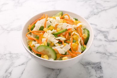 Photo of Tasty salad with Chinese cabbage, carrot, corn and cucumber in bowl on white marble table