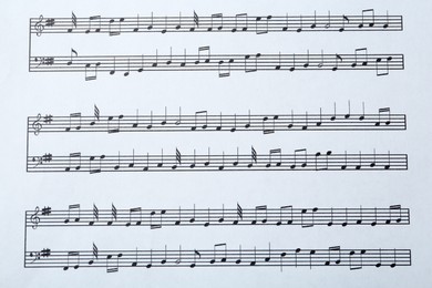 Photo of Paper sheet with musical notes, closeup view