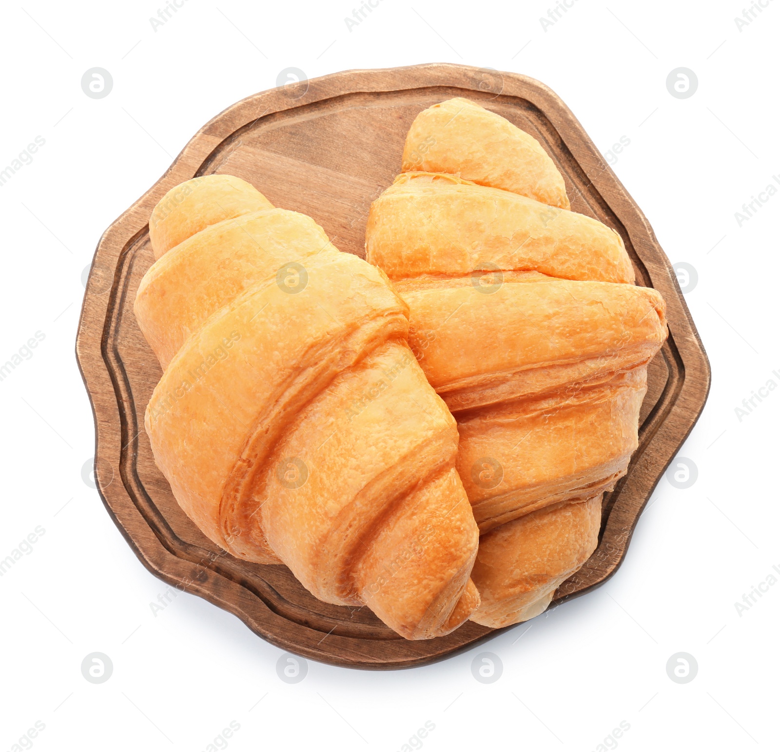 Photo of Wooden board with tasty croissants on white background, top view