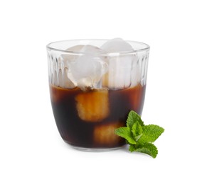 Refreshing iced coffee in glass and mint leaves isolated on white