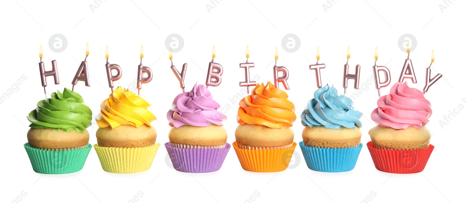 Photo of Birthday cupcakes with candles on white background