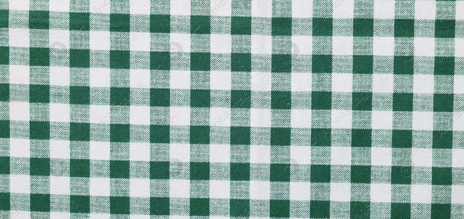 Photo of Texture of checkered fabric as background, top view