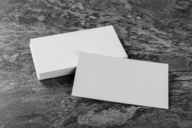 Photo of Blank business cards on grey background. Mockup for design