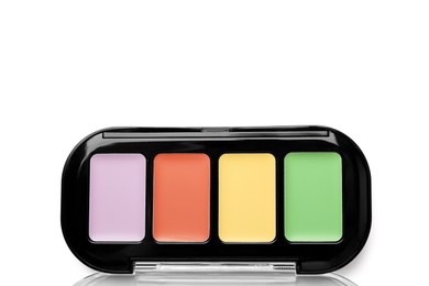 Colorful correcting concealer palette isolated on white, top view