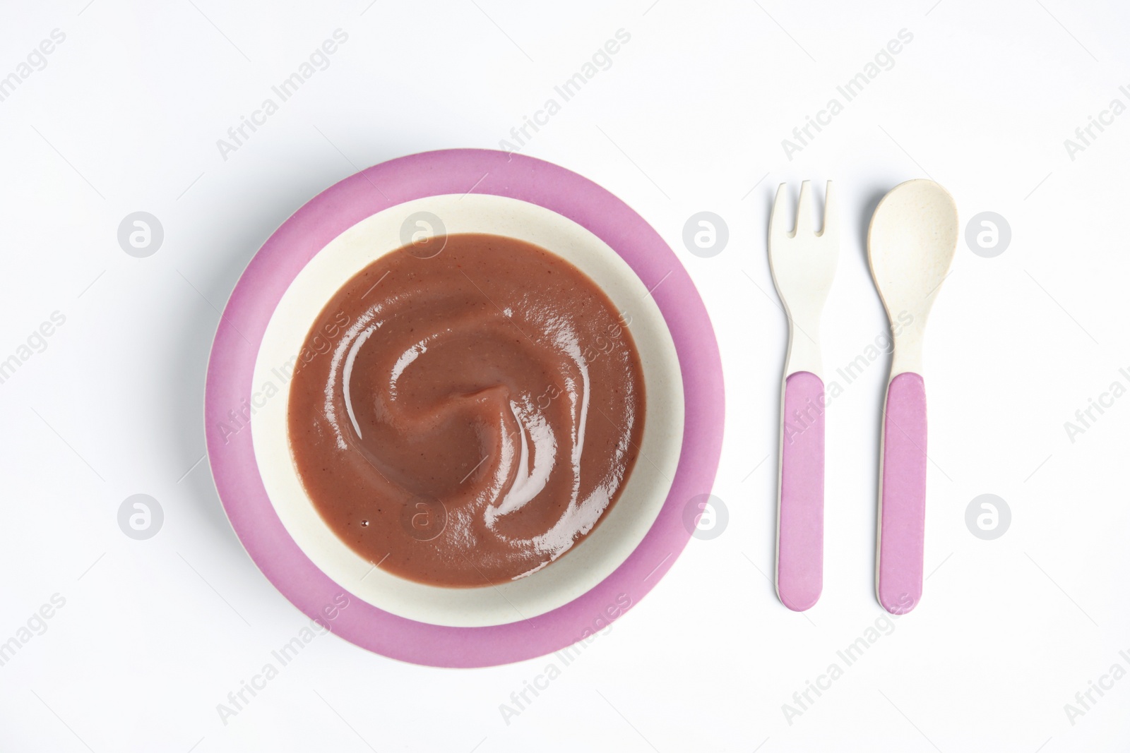 Photo of Healthy baby food, fork and spoon on white background, flat lay