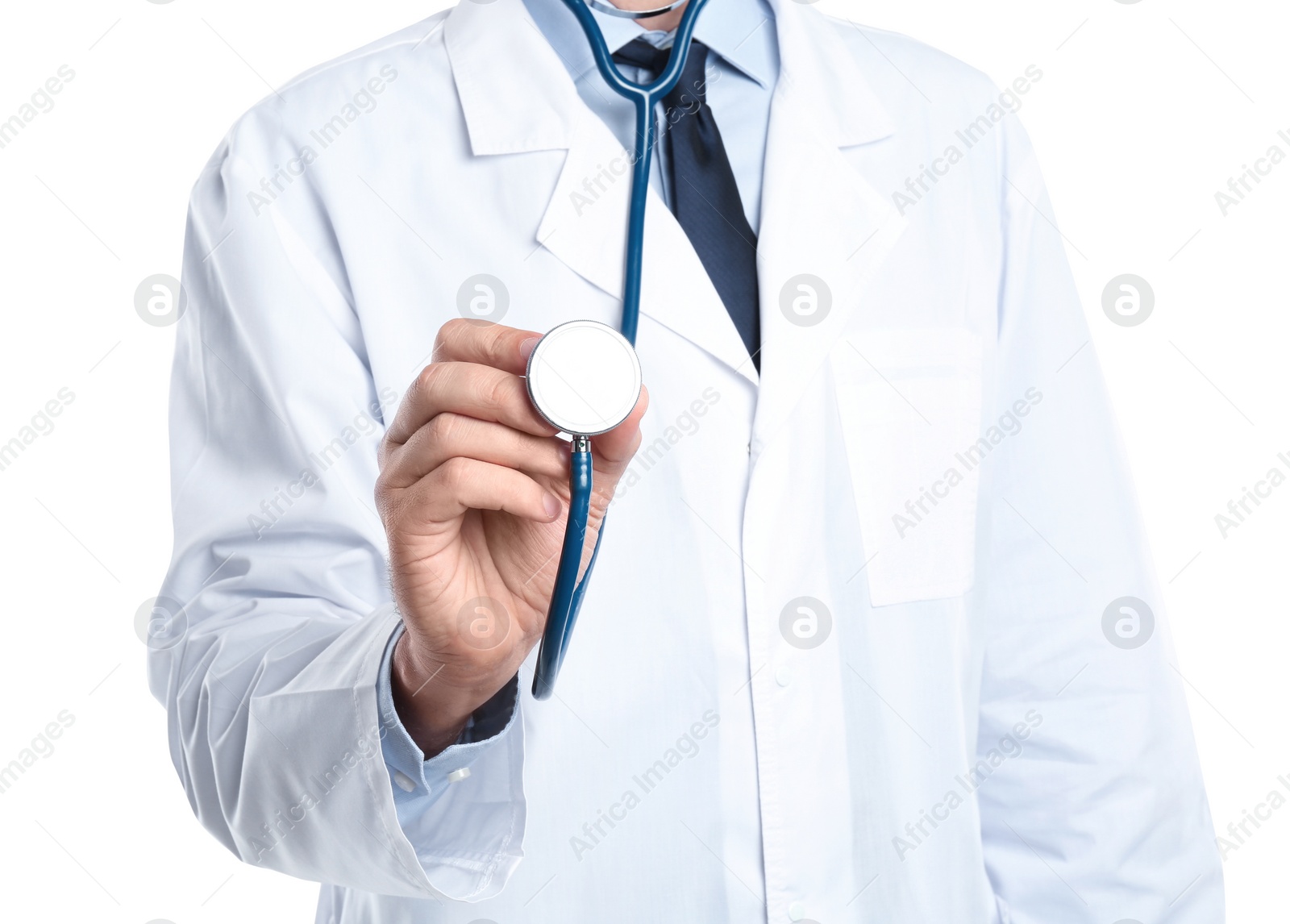 Photo of Male doctor holding stethoscope on white background, closeup