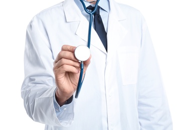 Male doctor holding stethoscope on white background, closeup