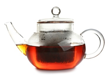 Glass pot with hot tea isolated on white