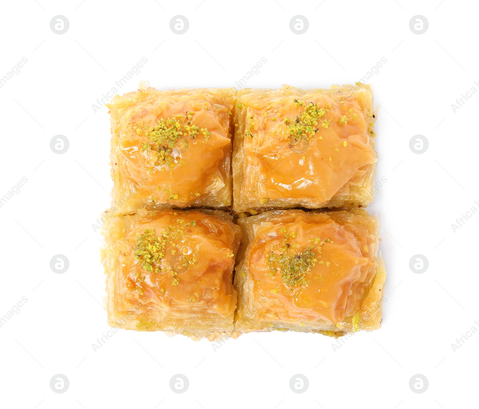 Photo of Delicious baklava with pistachios on white background, top view