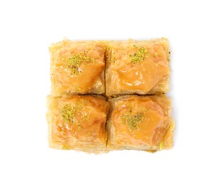 Photo of Delicious baklava with pistachios on white background, top view