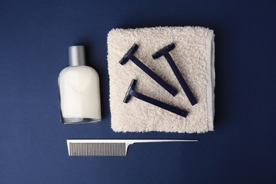 Photo of Flat lay composition with shaving accessories for men on blue background