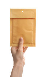 Woman holding kraft paper envelope on white background, closeup