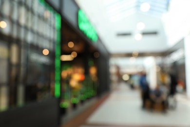 Photo of Blurred view of shopping mall interior. Bokeh effect