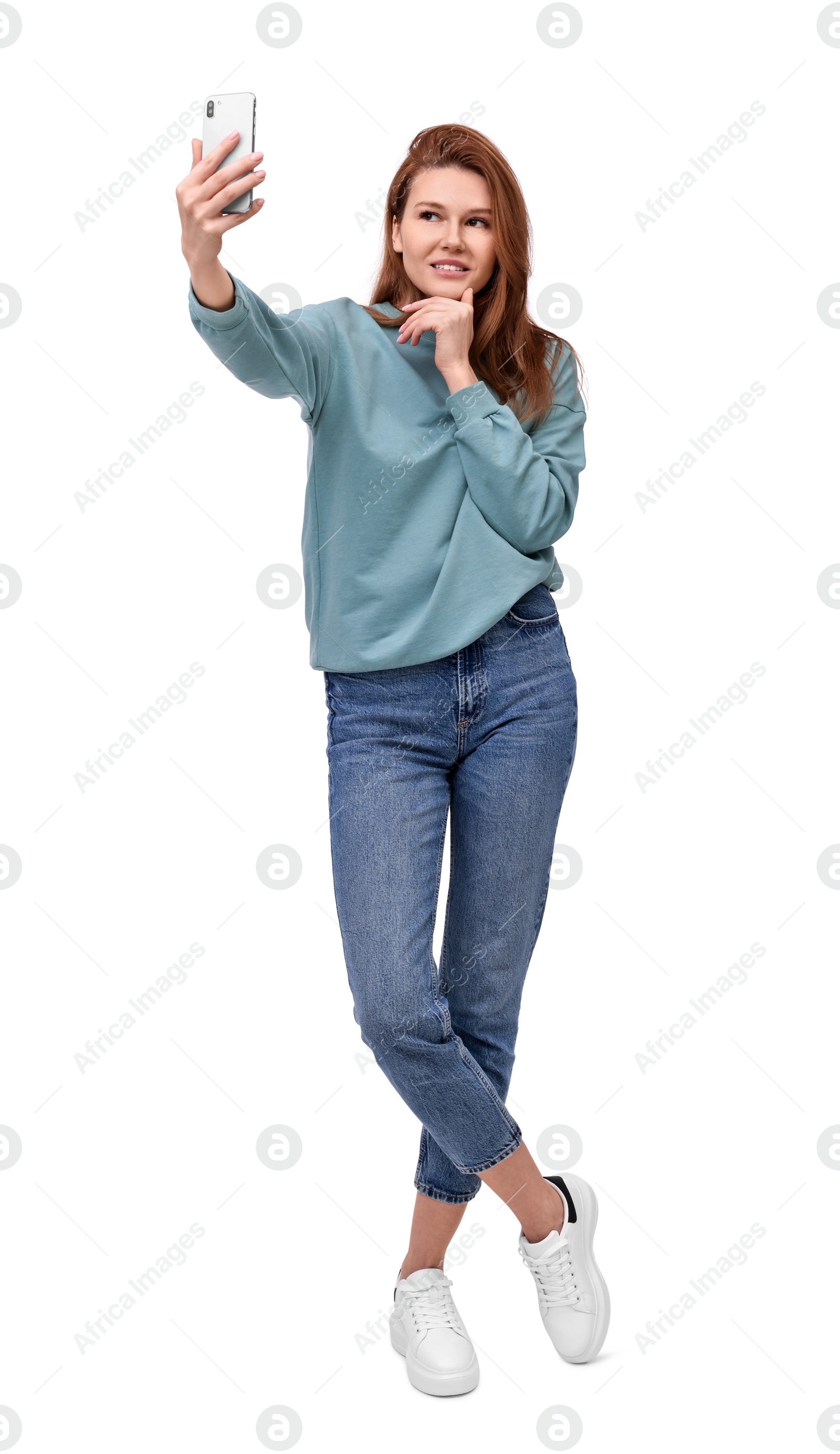 Photo of Beautiful woman taking selfie on white background