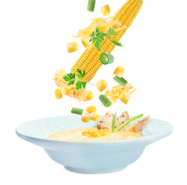 Image of Collage with ingredients falling into corn soup on white background 