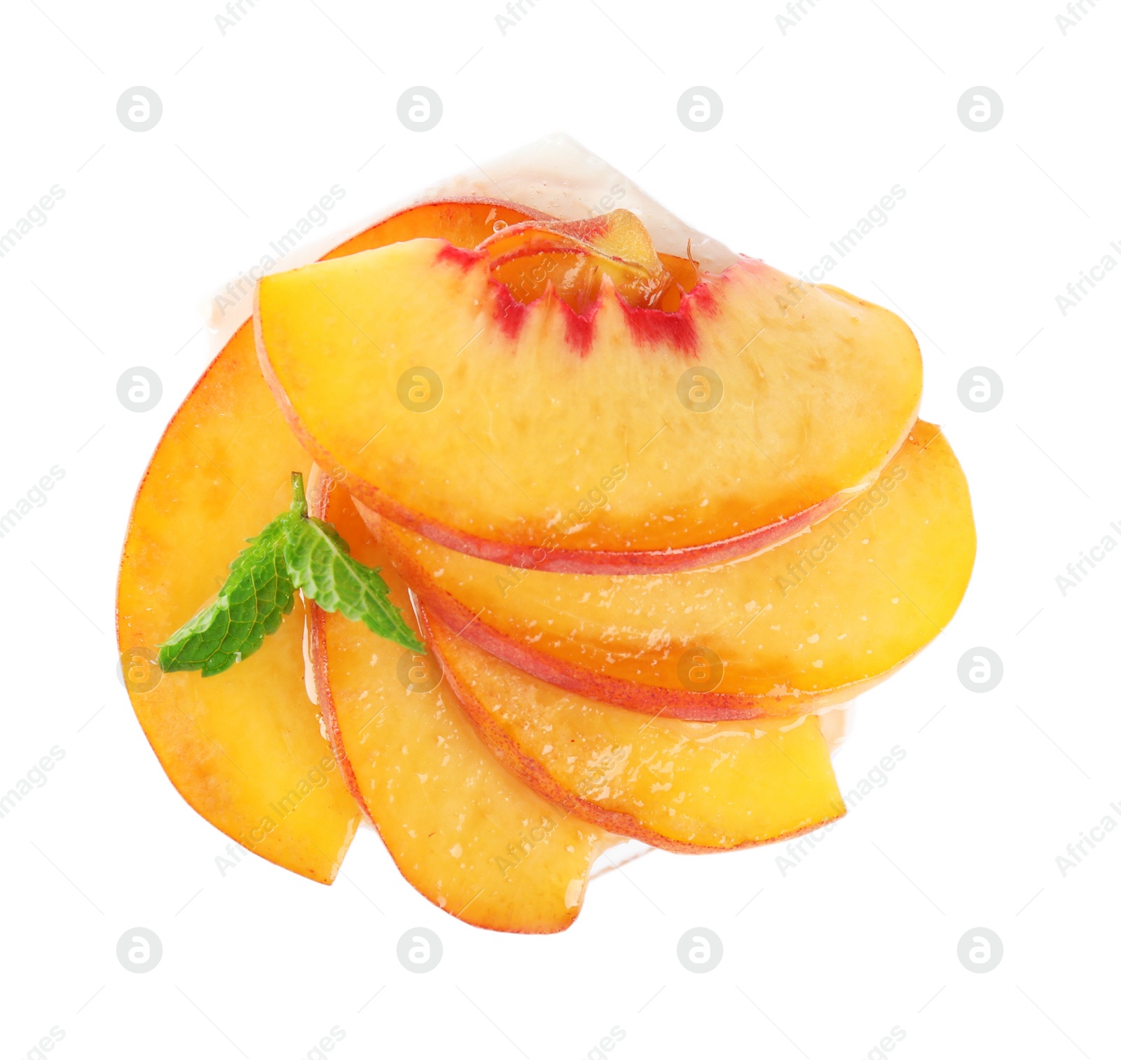Photo of Delicious dessert with peach slices isolated on white, top view