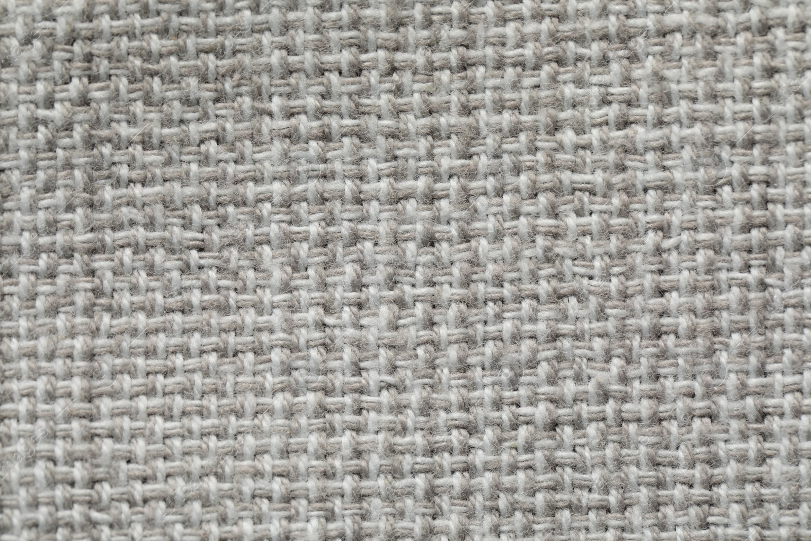 Photo of Texture of soft light grey fabric as background, top view