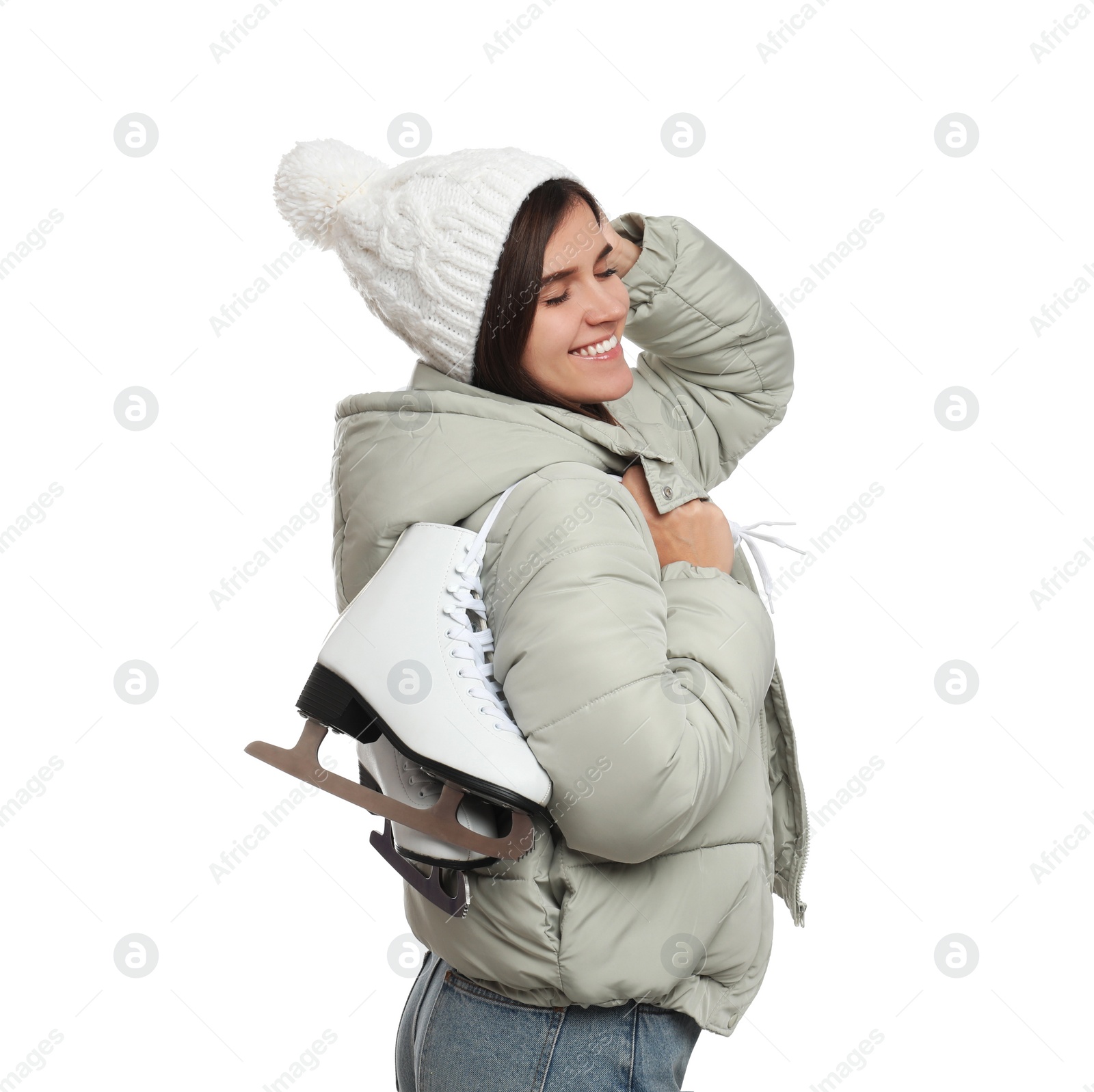 Photo of Happy woman with ice skates on white background