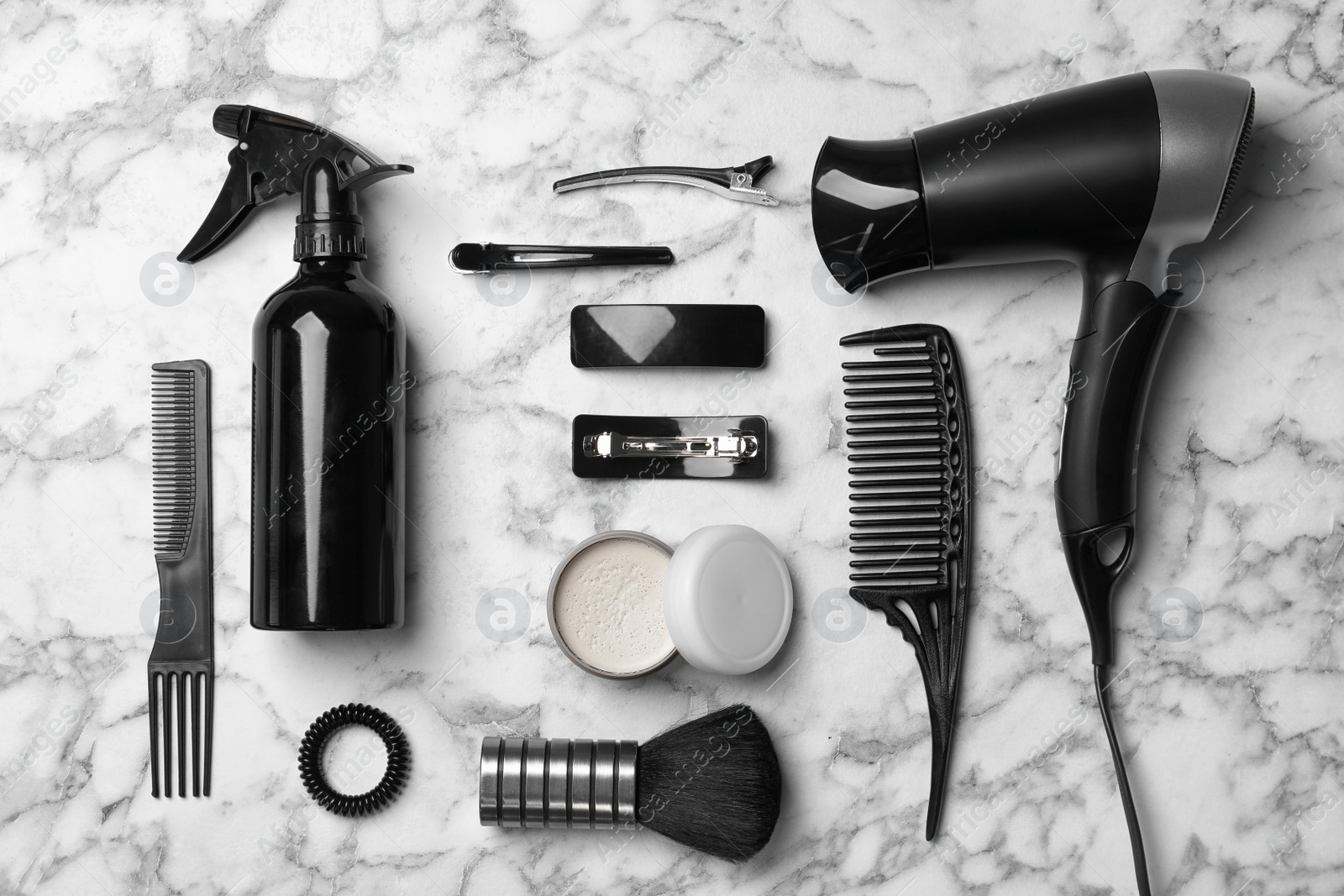 Photo of Professional hairdresser set on light background