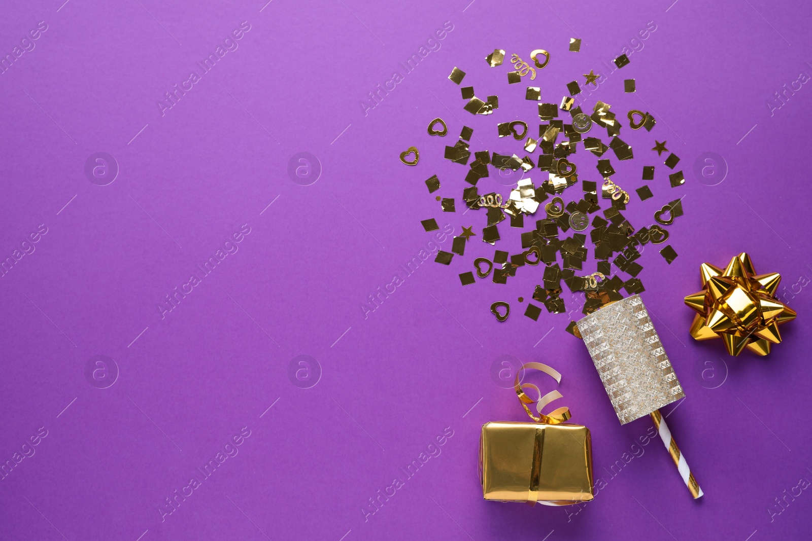 Photo of Flat lay composition of golden confetti and box on purple background, space for text
