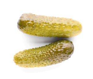 Photo of Tasty crunchy pickled cucumbers on white background, top view