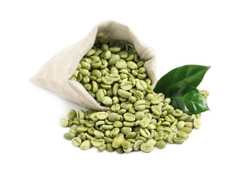 Photo of Overturned sackcloth bag with green coffee beans and leaves on white background
