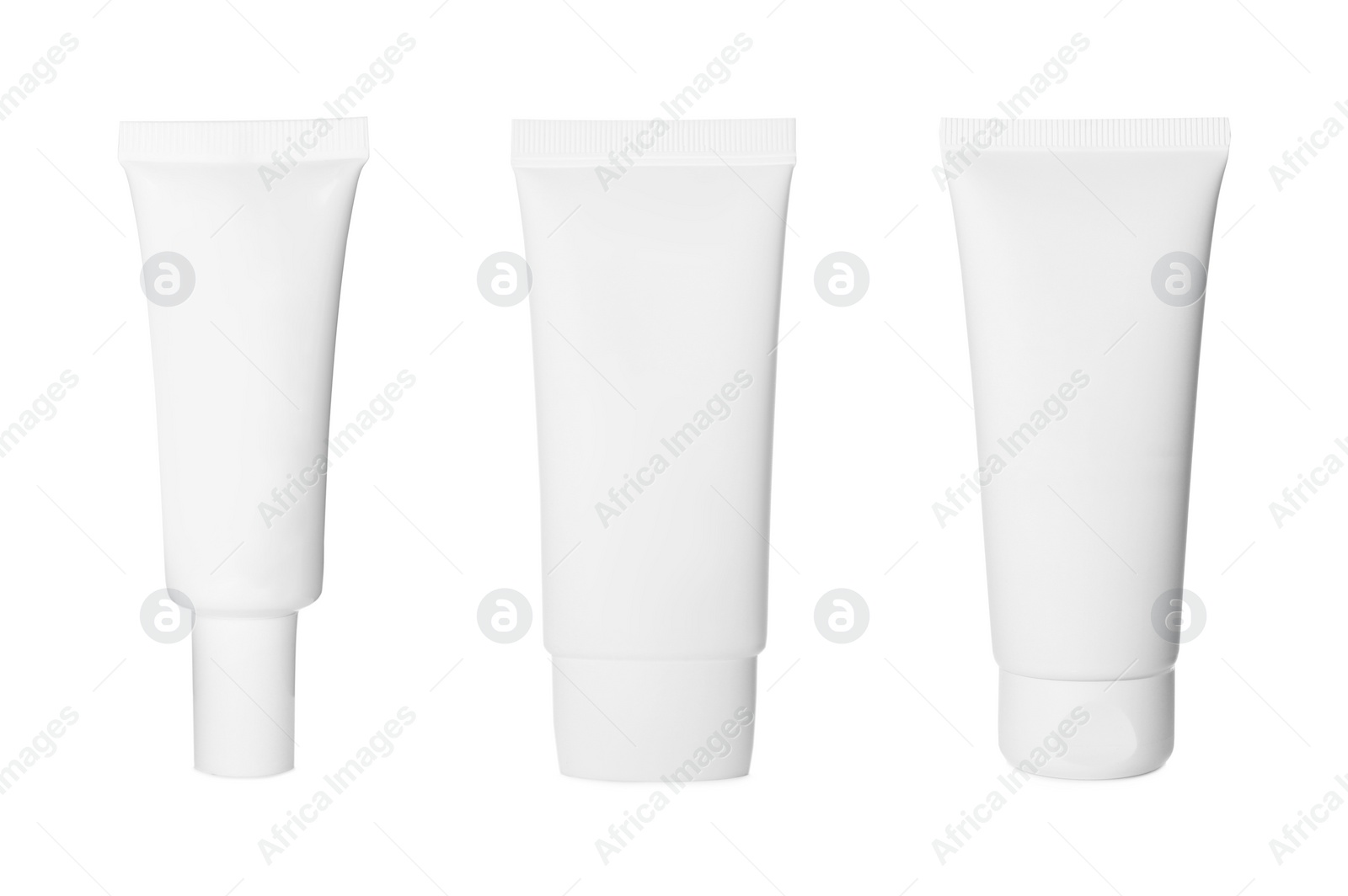 Image of Set with blank tubes of cosmetic products on white background. Mockup for design