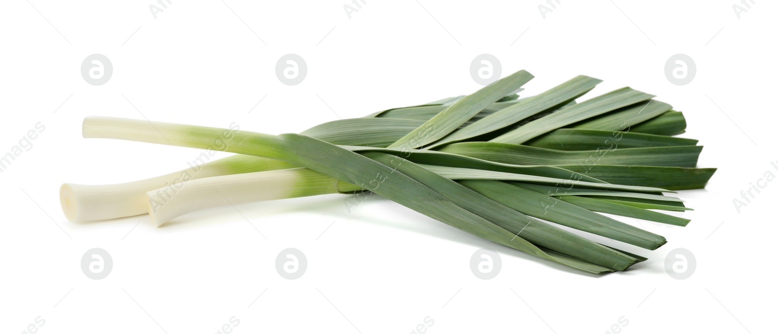 Photo of Fresh raw leeks on white background. Ripe onion