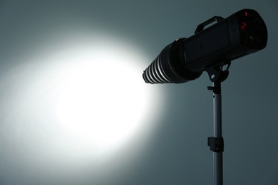 Studio lighting against gray background. Professional photo equipment