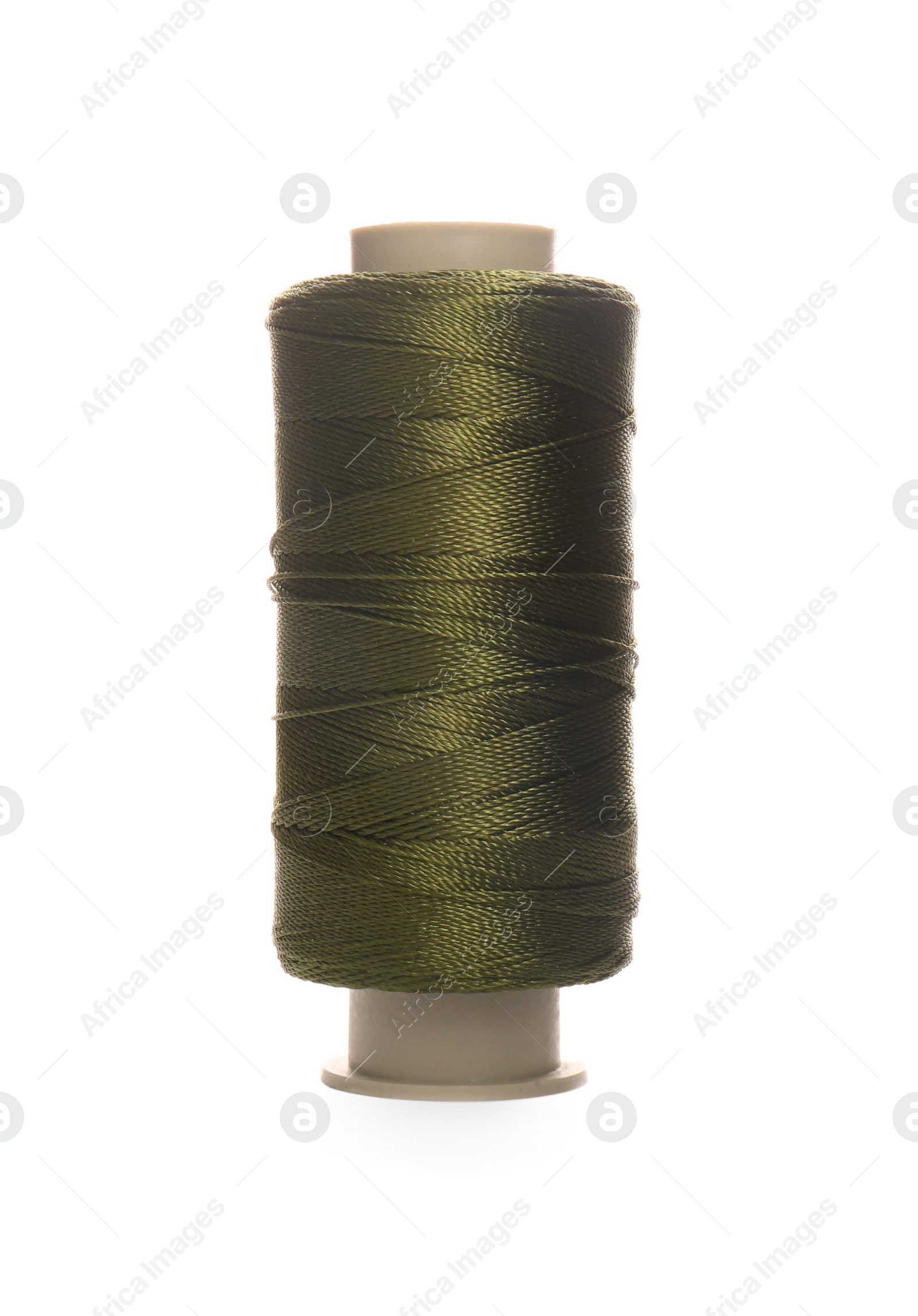 Photo of Spool of olive green sewing thread isolated on white