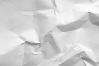 Crumpled sheet of paper as background, closeup