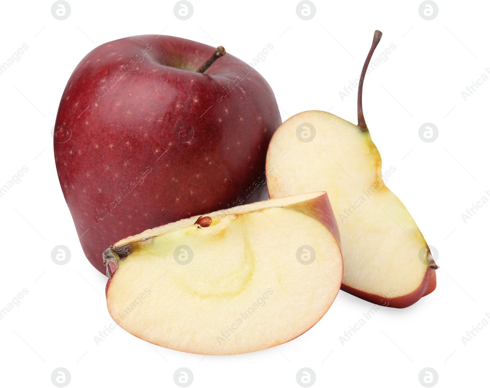 Whole and cut ripe red apples isolated on white Photo of Whole and cut ripe red apples isolated on white