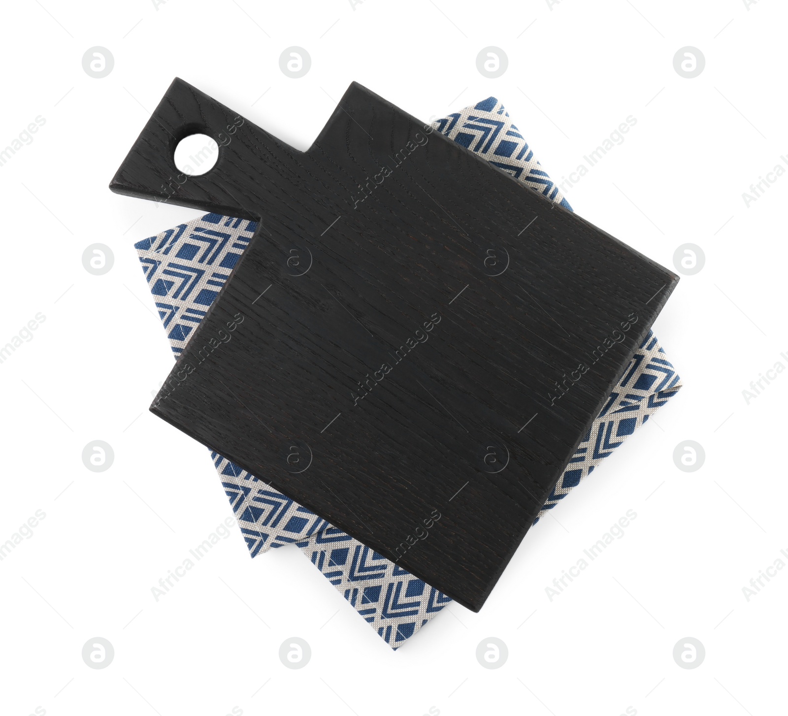 Photo of Black wooden cutting board and napkin isolated on white, top view