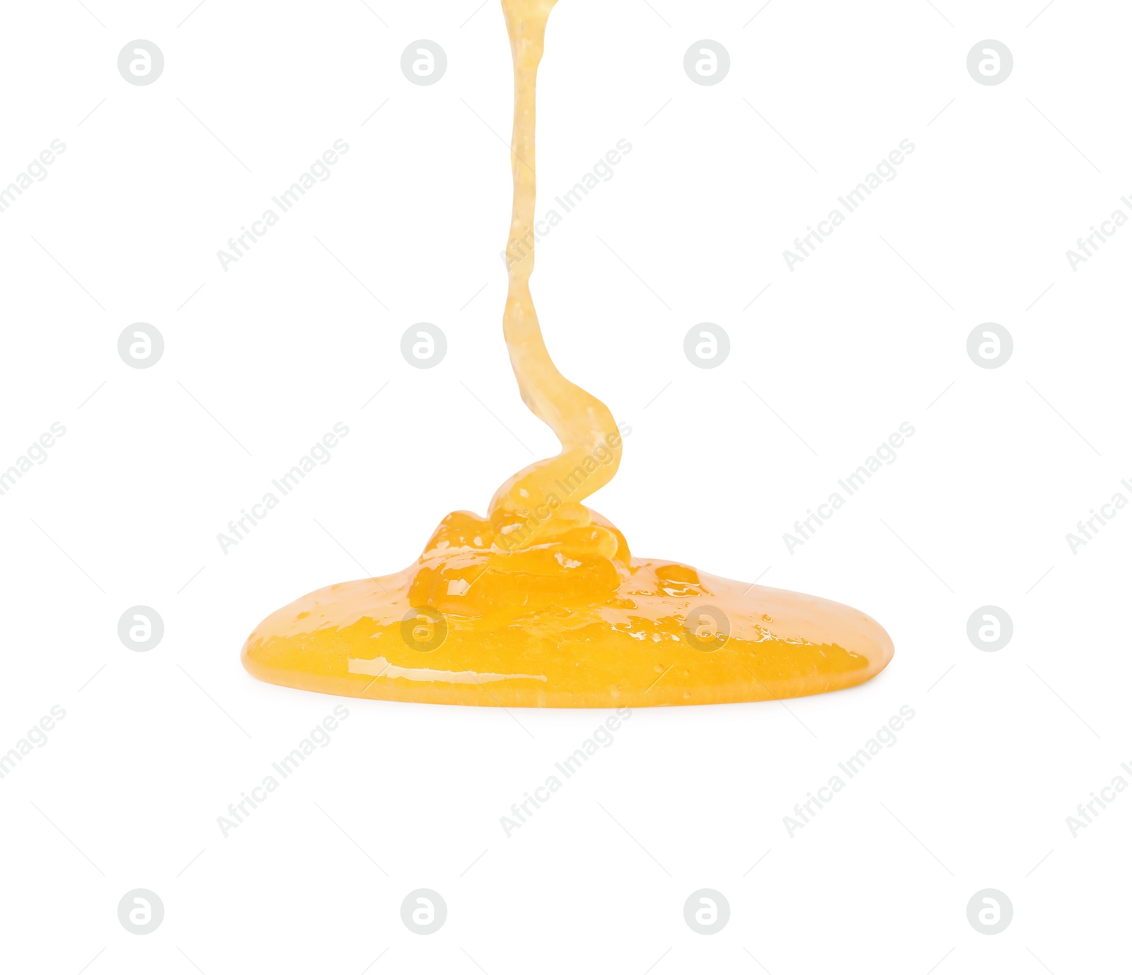 Photo of Pouring tasty natural honey isolated on white