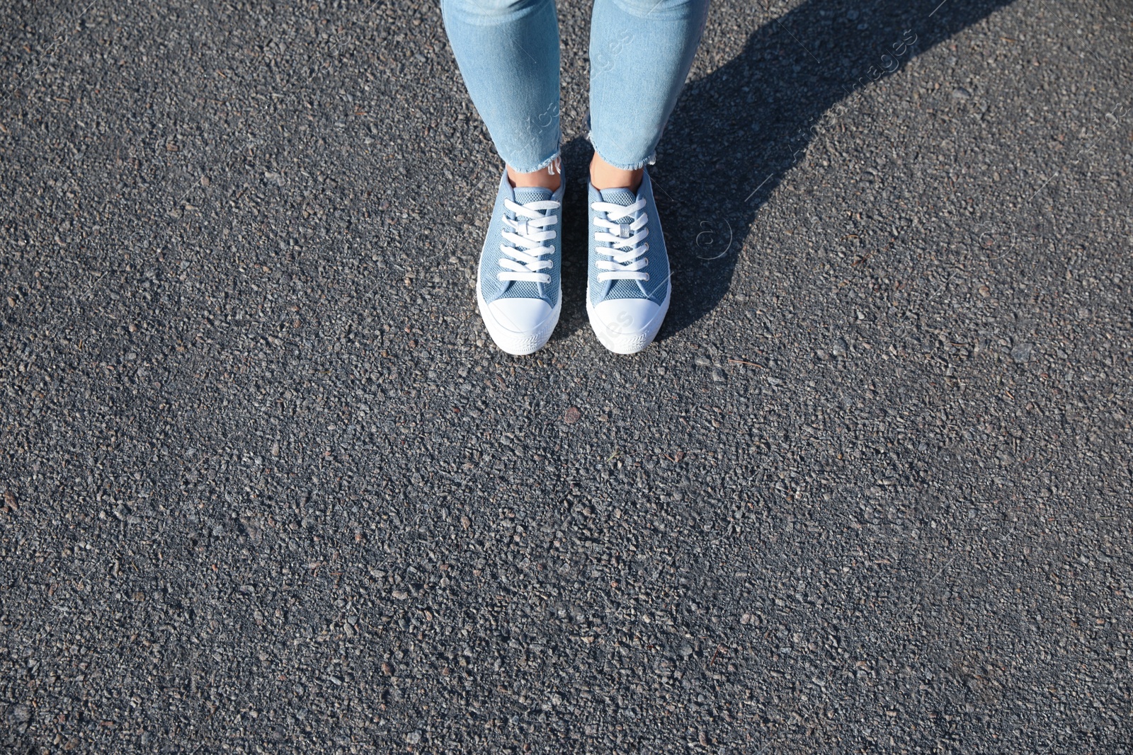 Photo of Woman standing outdoors, closeup with space for text. Choosing way concept.