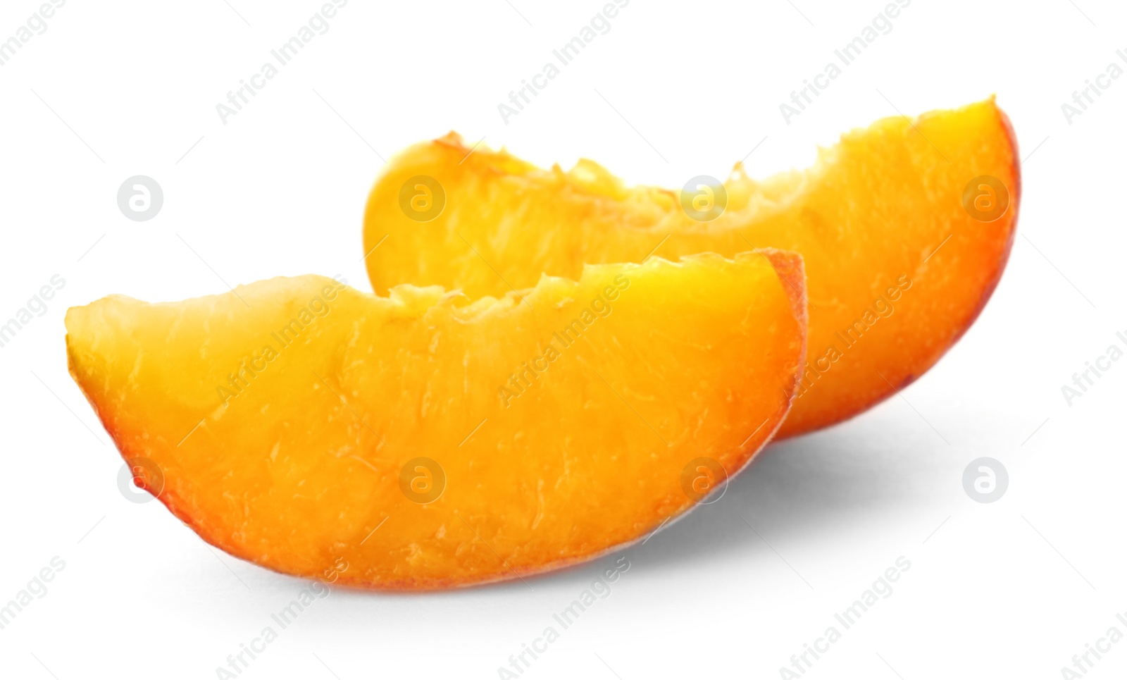 Photo of Slices of fresh sweet peach on white background