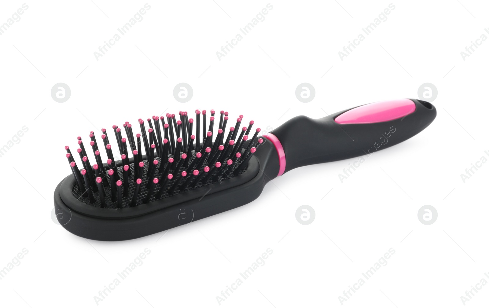 Photo of New modern hair brush isolated on white