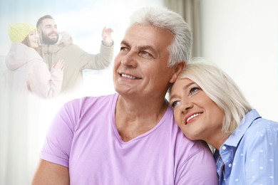 Image of Happy senior couple remembering old times. Translucent picture of young couple showing them in their youth