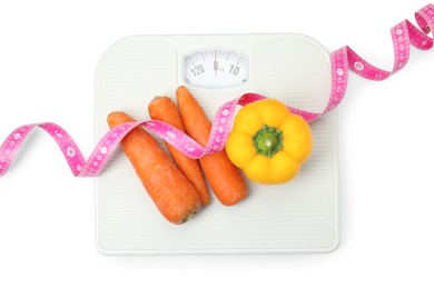 Photo of Flat lay composition with scales and vegetables on white background