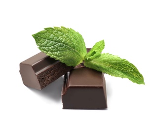 Photo of Pieces of dark chocolate with mint on white background