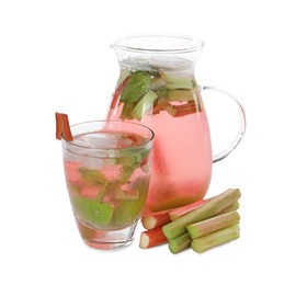 Glass and jug of tasty rhubarb cocktail with stems isolated on white