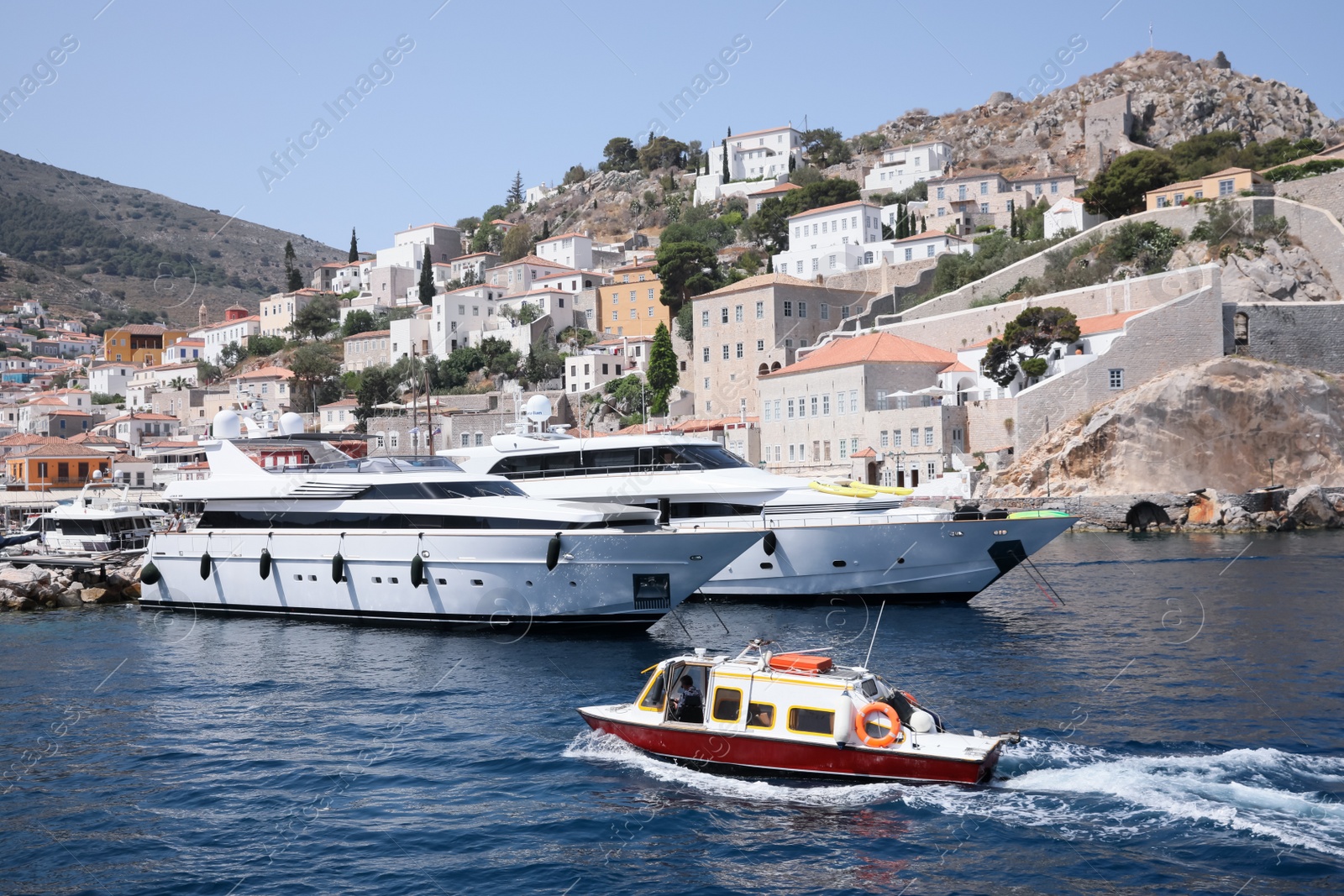 Photo of Beautiful view of sea with boats and coastal city