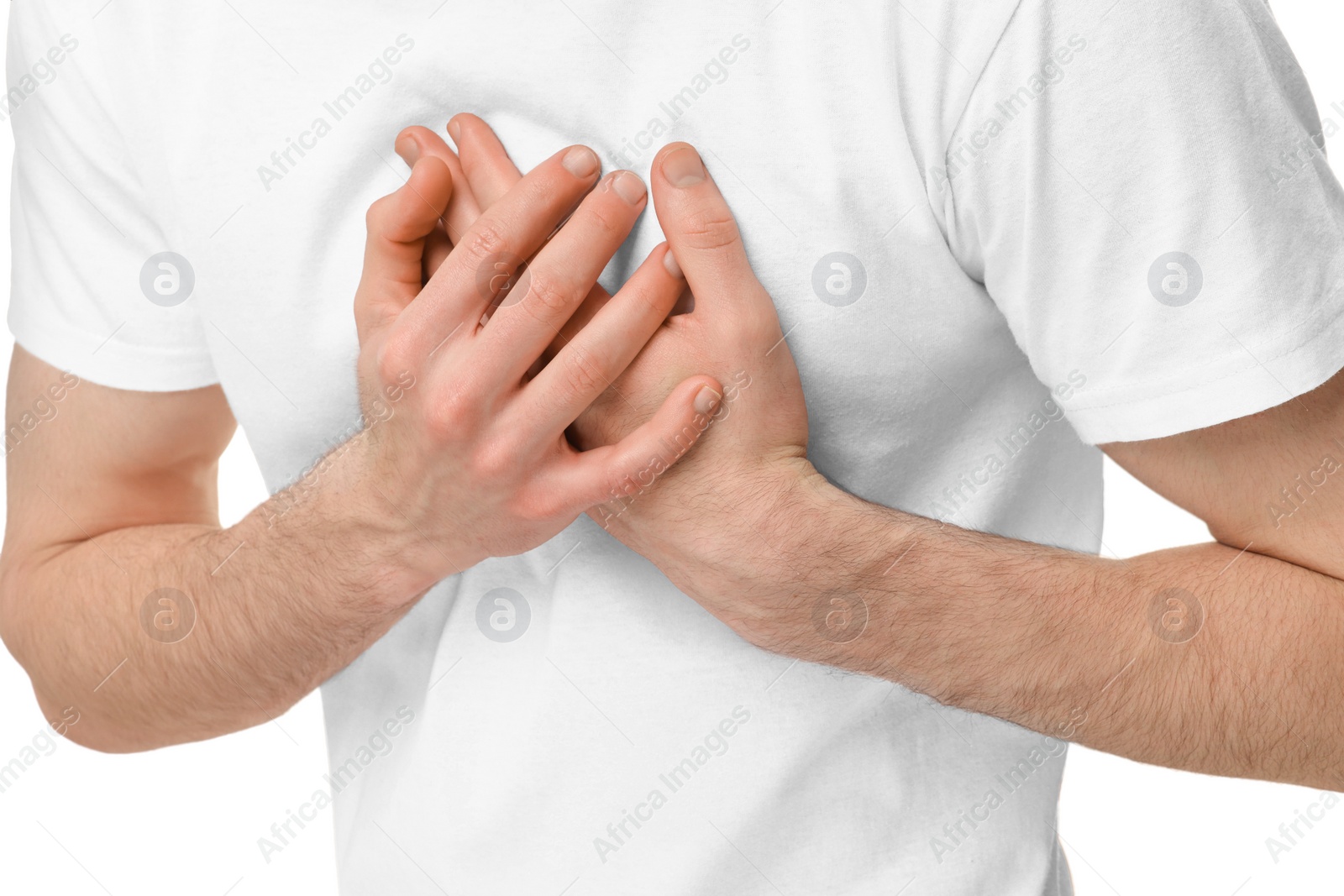 Photo of Man suffering from heart hurt on white background, closeup