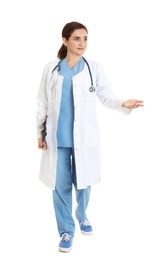 Full length portrait of female doctor with clipboard isolated on white. Medical staff