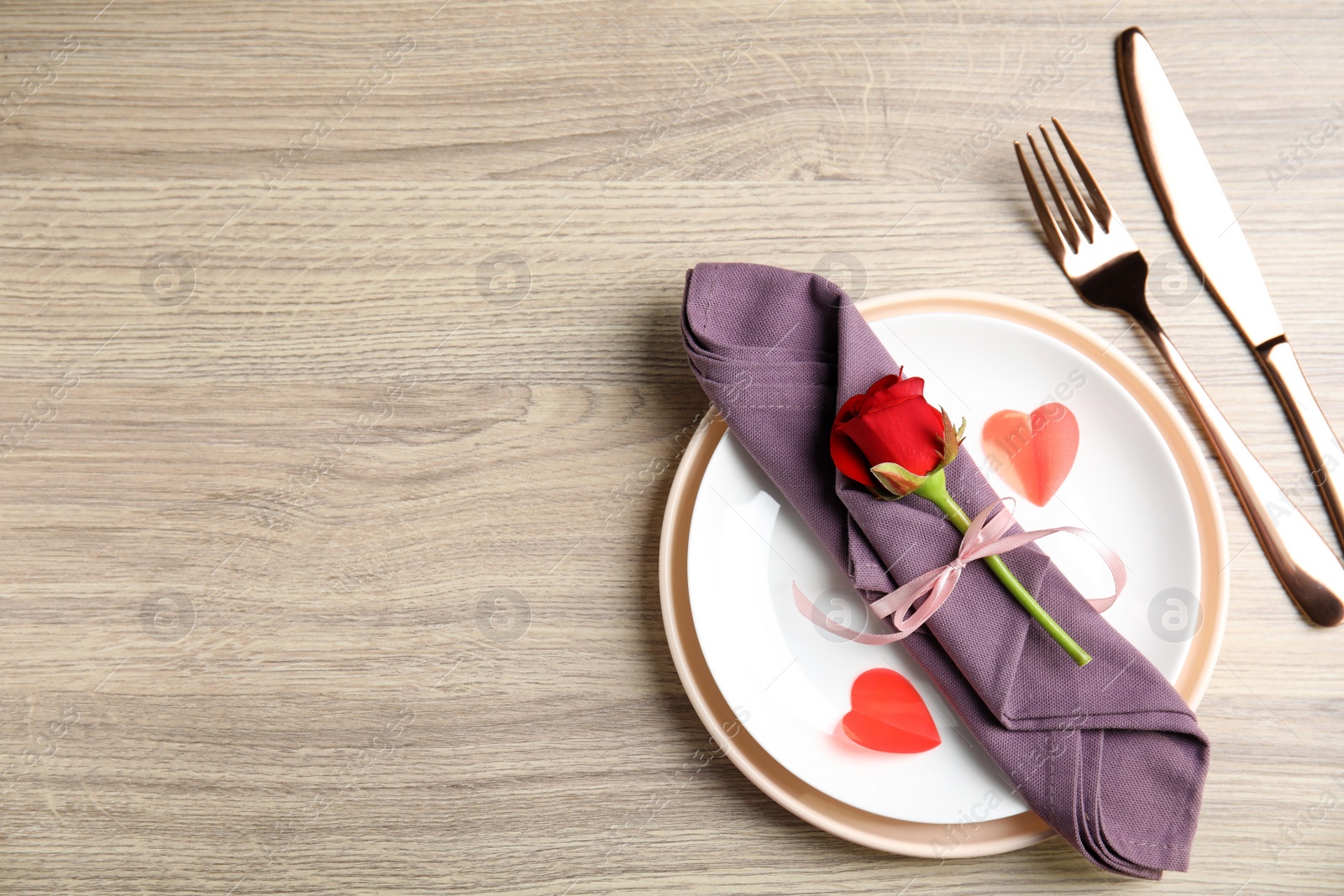 Photo of Beautiful place setting on wooden table, flat lay with space for text. Valentine's day romantic dinner