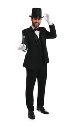 Happy magician in top hat holding wand on white background