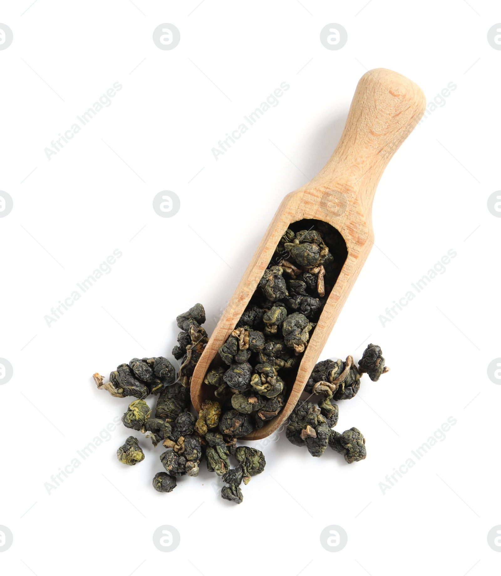 Photo of Wooden scoop with Ali Shan Oolong tea on white background, top view