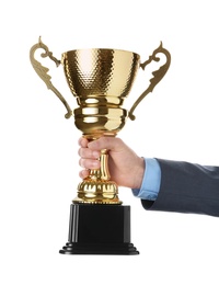 Photo of Man holding golden trophy cup on white background, closeup