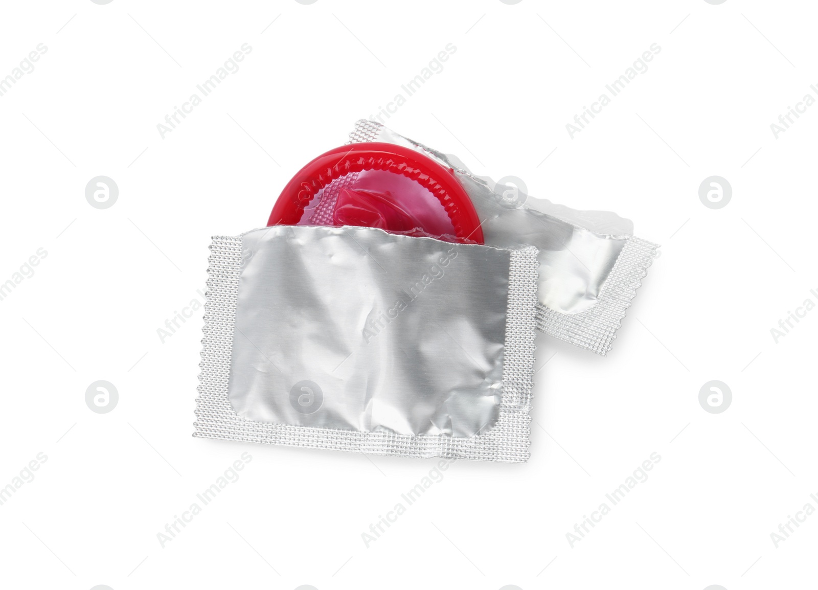 Photo of Condom in torn package on white background, top view. Safe sex