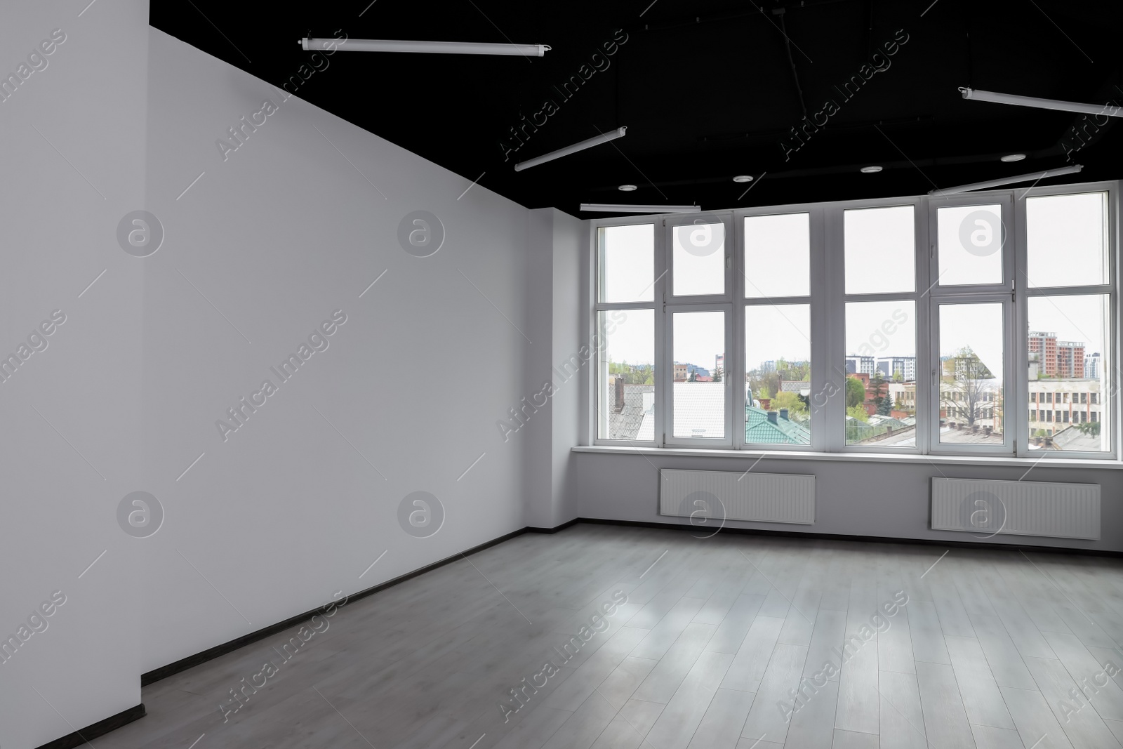 Photo of Modern office with white wall and window. Interior design